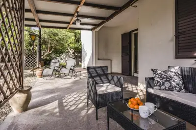 Area soggiorno di Ortensia Apartments by Wonderful Italy
