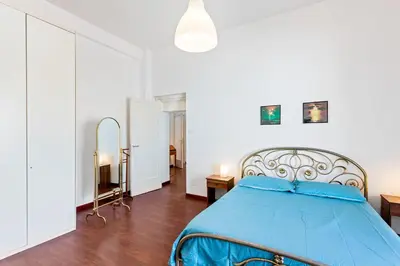 Letto o letti in una camera di GuestHost - Libertà Frame Apartment with Terrace and Etna view