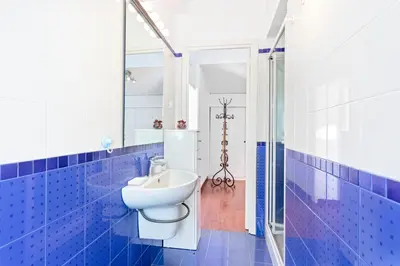 Bagno di GuestHost - Libertà Frame Apartment with Terrace and Etna view