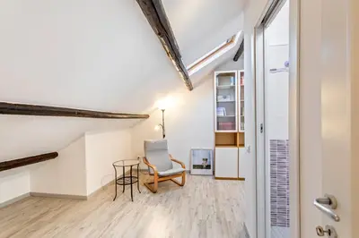 Area soggiorno di GuestHost - Libertà Frame Apartment with Terrace and Etna view