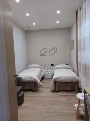 Letto o letti in una camera di Rusina