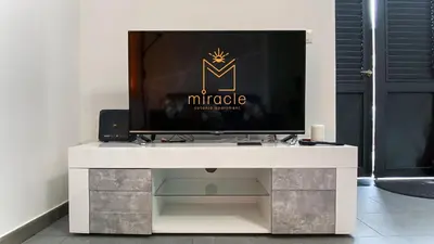 TV o dispositivi per l'intrattenimento presso Miracle apartment