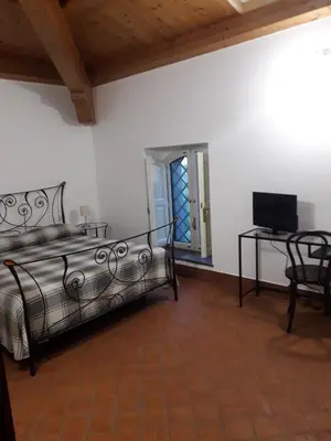Letto o letti in una camera di Contrada Zerbate