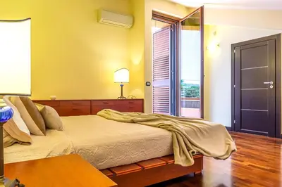 Letto o letti in una camera di Villa Magdalena