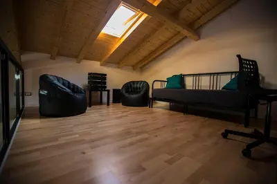 Area soggiorno di Hygge House Catania