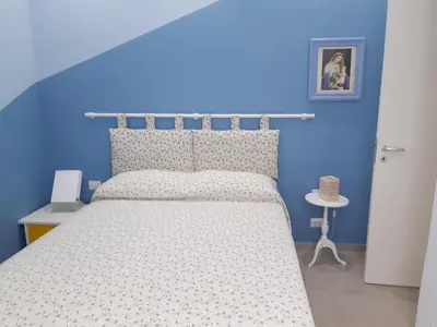 Letto o letti in una camera di Casa RoSa