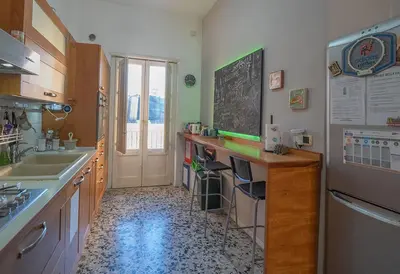 Cucina o angolo cottura di Casa Siciliana nel Centro Storico di Catania 3 Camere 10 Ospiti 119m2