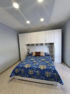 Letto o letti in una camera di NEW PANORAMA