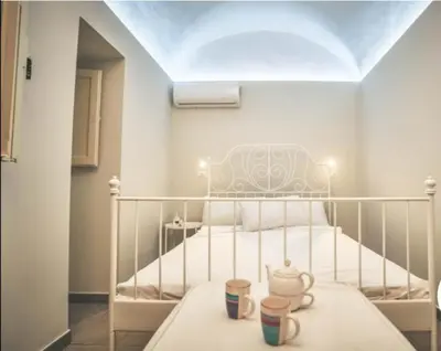 Letto o letti in una camera di Il Cortiletto