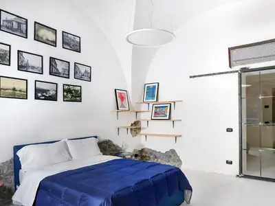 Letto o letti in una camera di Pescheria Industriale