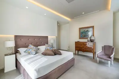 Letto o letti in una camera di Villa Isabella