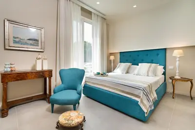 Letto o letti in una camera di Villa Isabella