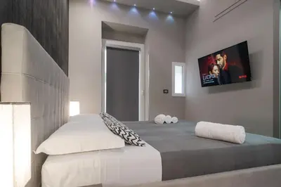 Letto o letti in una camera di Suite Catania Lungomare