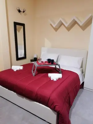 Letto o letti in una camera di Oasi del Borgo