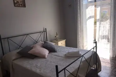 Letto o letti in una camera di casa vacanze Mavaria