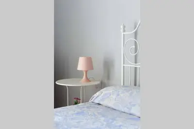 Letto o letti in una camera di casa vacanze Mavaria