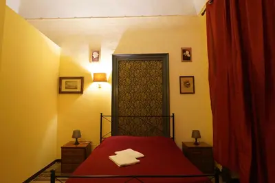 Letto o letti in una camera di Hotel Etnea