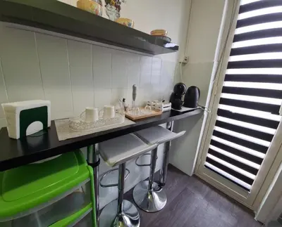 Cucina o angolo cottura di Cibali Metro Stay