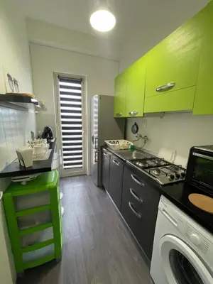 Cucina o angolo cottura di Cibali Metro Stay