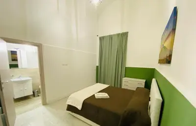 Letto o letti in una camera di Il Vicolo Home 2