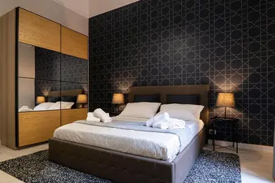 Letto o letti in una camera di Casa Magò