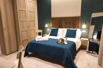 Letto o letti in una camera di D'Annunzio Street Home(Appartamento uso turistico)
