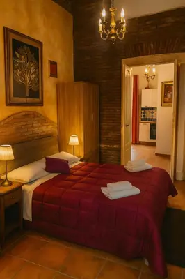 Letto o letti in una camera di Bellavista