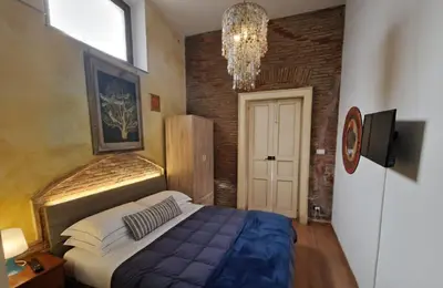 Letto o letti in una camera di Bellavista