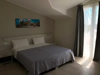 Letto o letti in una camera di La Conca
