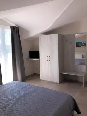Letto o letti in una camera di La Conca