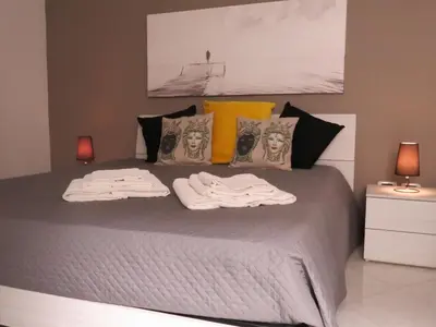 Letto o letti in una camera di Focu e Mari
