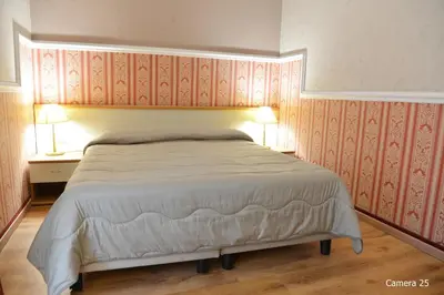 Letto o letti in una camera di Catania Centro Rooms