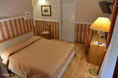 Letto o letti in una camera di Catania Centro Rooms