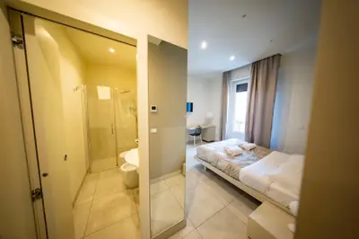 Letto o letti in una camera di CATANIA LIVING ROOMS