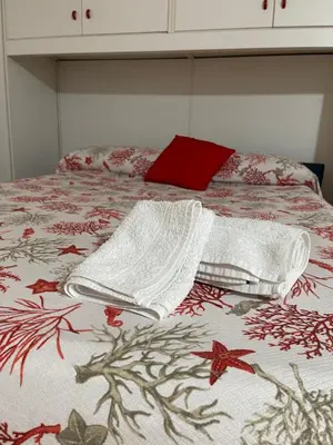 Letto o letti in una camera di Monolocale al BlueMarine