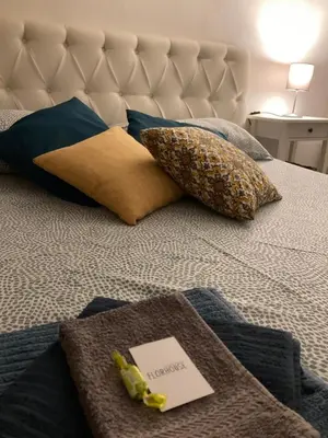 Letto o letti in una camera di Florhouse Pacini