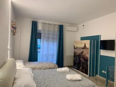Letto o letti in una camera di Catania Apartment Borgo Suite Autonomous