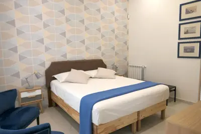 Letto o letti in una camera di Casa Consoli