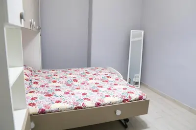 Letto o letti in una camera di Casa Mitch