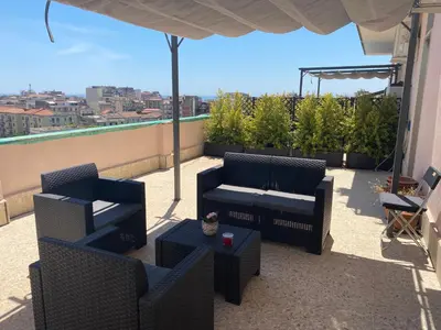 Area soggiorno di Your Apartment Catania