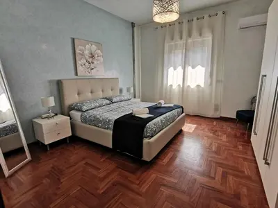 Letto o letti in una camera di Casa Ruby