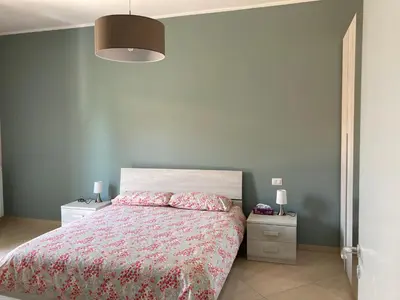 Letto o letti in una camera di Casa Etna Nicolosi