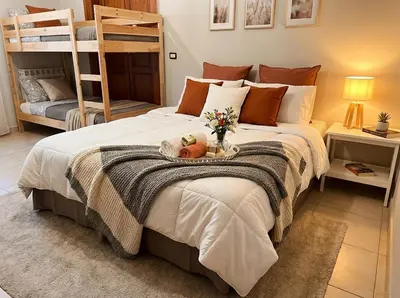Letto o letti in una camera di Le Nereidi b&b Acireale Centro