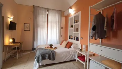 Letto o letti in una camera di Le Nereidi b&b Acireale Centro