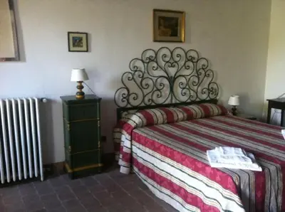Letto o letti in una camera di La Rocca della Rosa