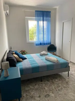 Letto o letti in una camera di Cutapp Guest House