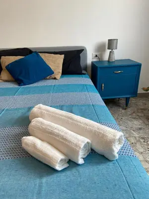 Letto o letti in una camera di Cutapp Guest House