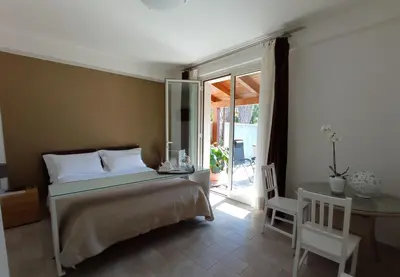 Letto o letti in una camera di B&B Casa Althea