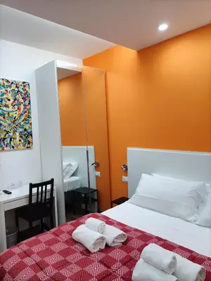 Letto o letti in una camera di Luxury B&B Iolanda
