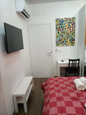 Letto o letti in una camera di Luxury B&B Iolanda